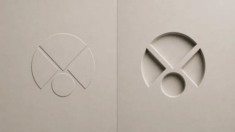 One mark rendered twice with a shallow bevel and a deep carve